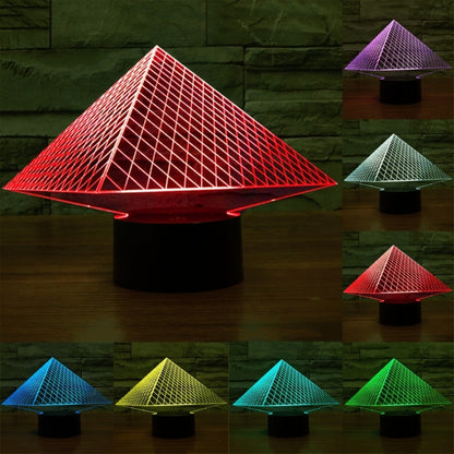 Pyramid LED desk lamp with glowing red triangular grid over black base