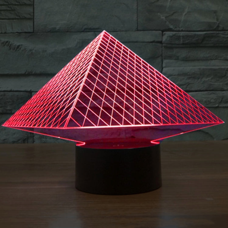 Pyramid LED desk lamp with glowing red triangular grid and base light glow