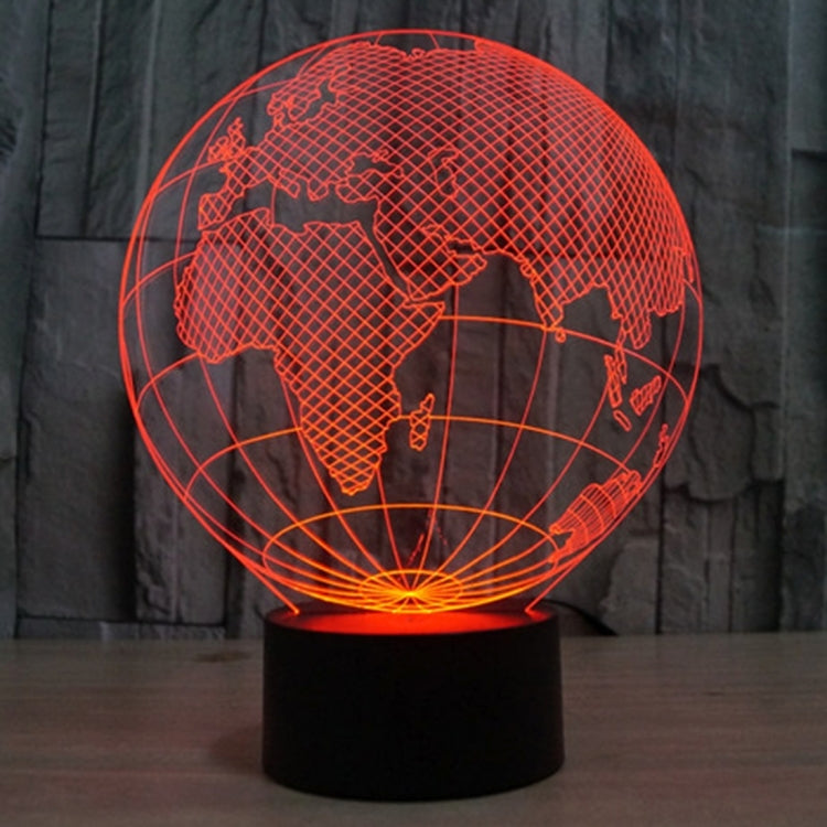 Red-lit globe desk lamp showing world map lines on a black base