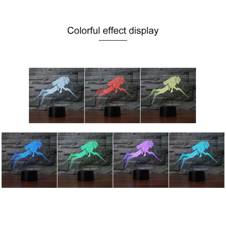 3D LED diver night light displayed in multiple colors on black base