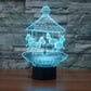 Glowing blue carousel 3D LED night light on black cylindrical rechargeable base