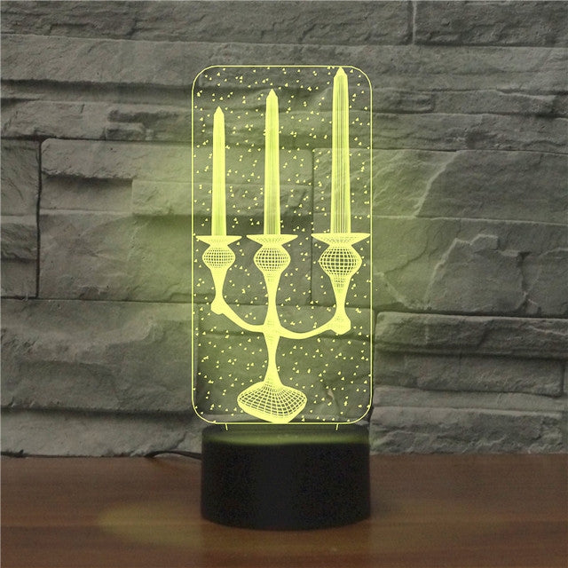 3D LED candle night light with black base, warm green glow panel