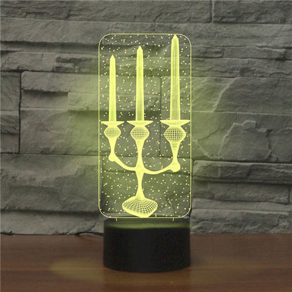 3D LED candle night light with black base, warm green glow panel