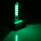 USB LED night light glowing green with 5 LEDs through clear casing