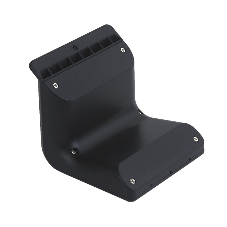 Black solar wall light underside view with mounting screws and solar panel