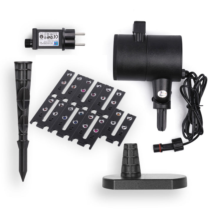 Black outdoor lawn pattern projector lamp kit with power adapter, plates, and cables