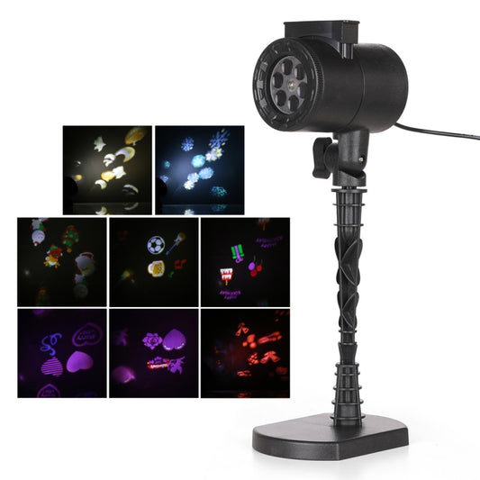 Black outdoor lawn pattern projector lamp with ground stake base and rotating head