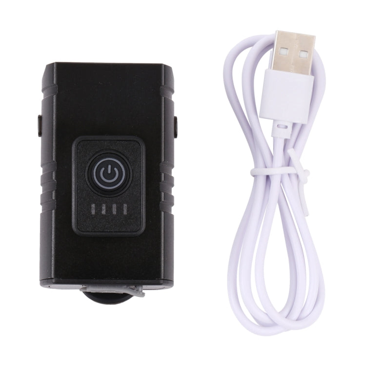 Black bike headlight with power button and white micro USB charging cable
