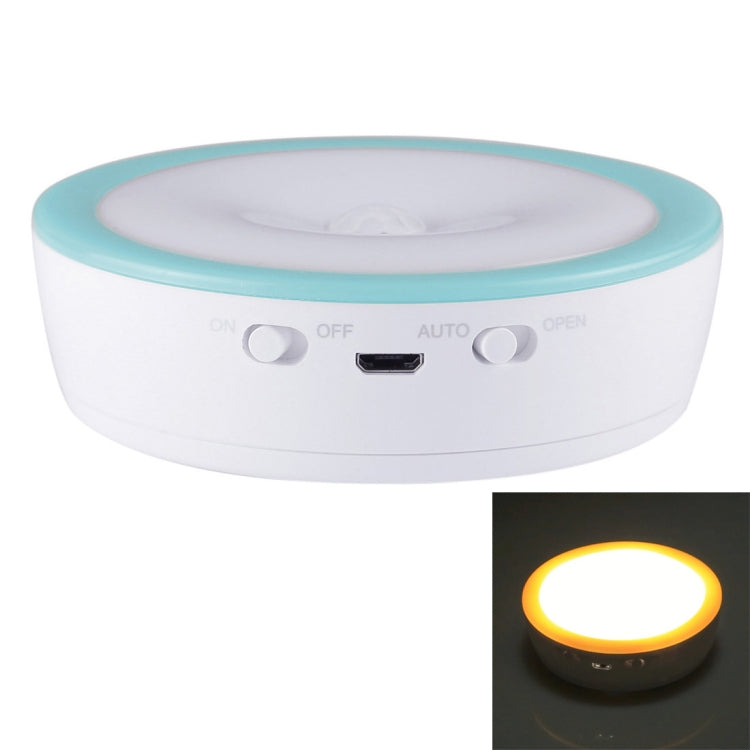 White and teal circular emergency cabinet light with buttons and charging port, glowing LED ring