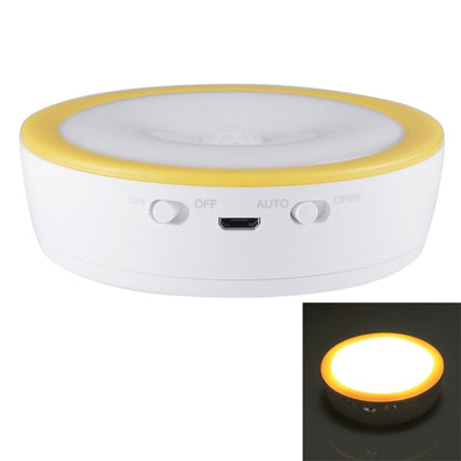 Round LED cabinet emergency light, white body with yellow rim, top ON/OFF/AUTO controls