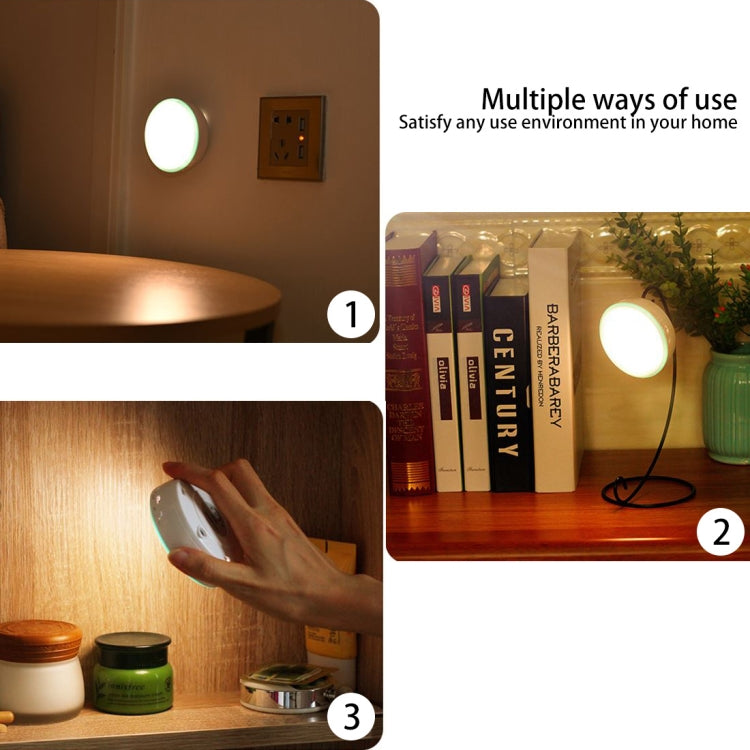 Glowing round LED cabinet emergency light on wall shelf in home setting