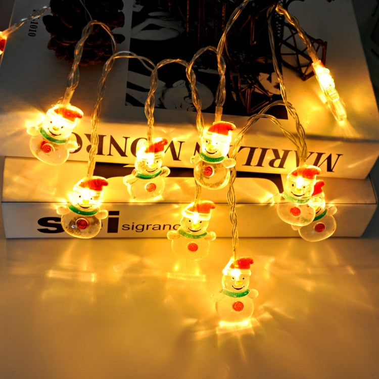LED light string with warm glowing snowman and tree bulb ornaments