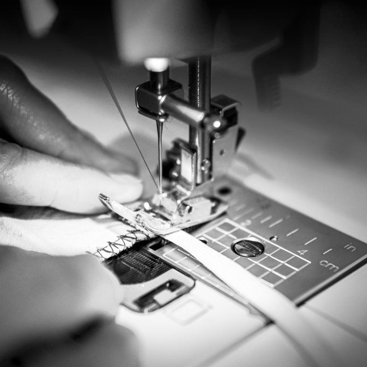 Sewing machine LED lamp lighting up work area with magnetic U-shaped panels
