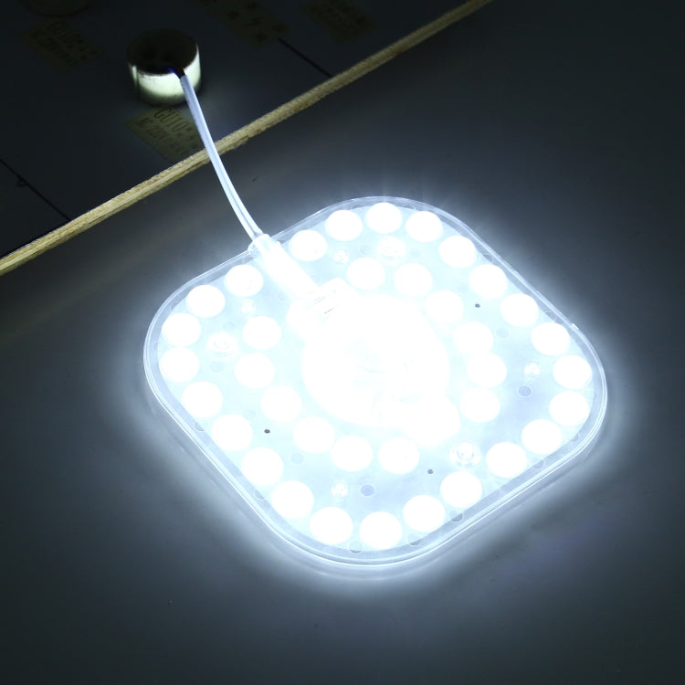 Lit square LED ceiling light module with 36 LEDs glowing white