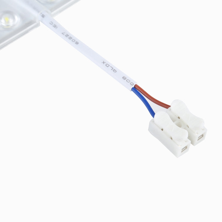 LED panel module wire leads with blue and brown insulation and white plug connector