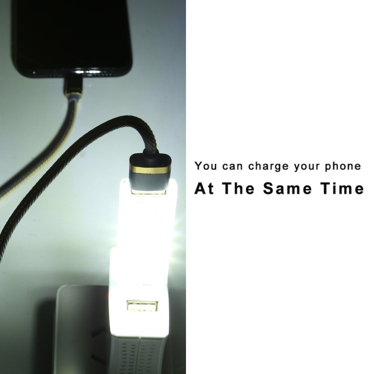 Double-sided USB LED light lit in clear case, with attached USB charging cable