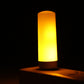Lit USB LED flameless candle night light with warm yellow-orange glow