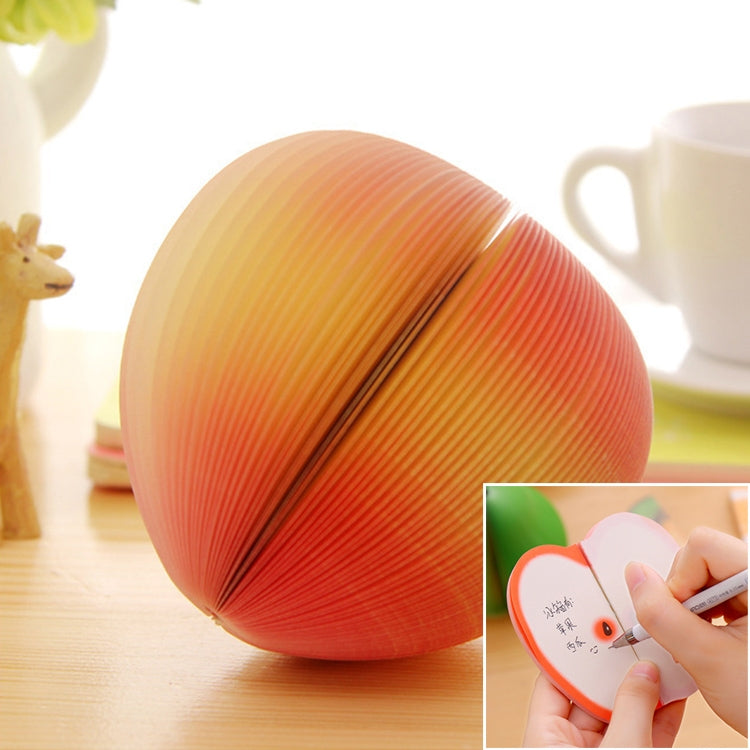 Peaches-colored note sticker with orange accordion ridges and writing inset