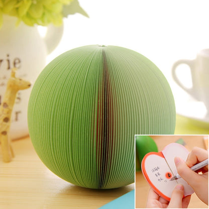 Watermelon-shaped note sticker with green accordion ridges and small writing inset