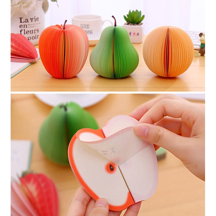 Set of fruit note stickers in red, green, and orange with hand holding a note