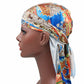 Printed headscarf cap with long neck tie, multicolor motifs, tied back drape