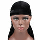 Black velvet turban cap with folded band and long trailing tail