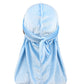 Light blue velvet turban cap with tied back and long trailing drape