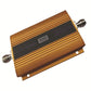 Gold LTE signal repeater booster angled view with coax connectors on both ends.