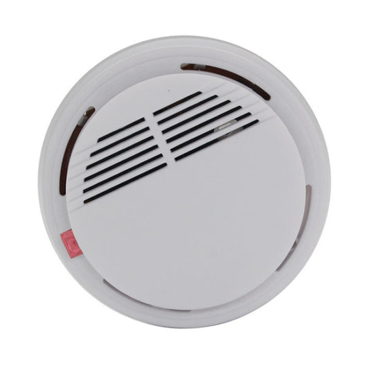 White smoke alarm with diagonal vent slots on the top cover.