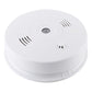 White smoke and heat detector with circular sensor window and side vent slits