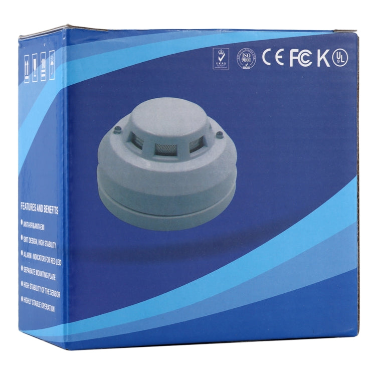 Photoelectric smoke detector product box with grey unit shown inside packaging.