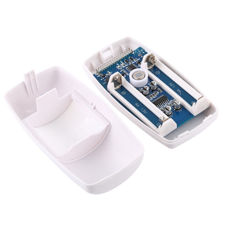 Wireless PIR detector circuit board in white plastic case with mounting base