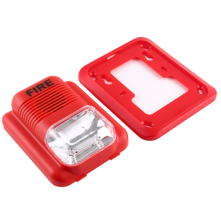 Red fire alarm strobe horn with mounting base frame and clear strobe lens