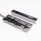 Magnetic sensor contacts with two metal pieces and coiled lead for door detection