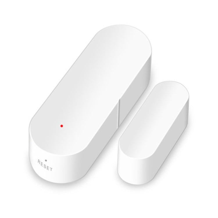 White door/window sensor pair with magnet contact, oval housings and red LED dot