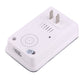 Wireless doorbell transmitter back with speaker grille and mounting prongs on white body