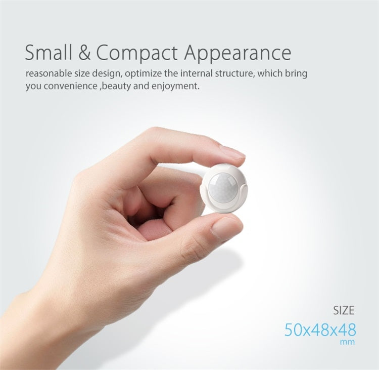 White compact PIR motion sensor, small round body held in a hand.