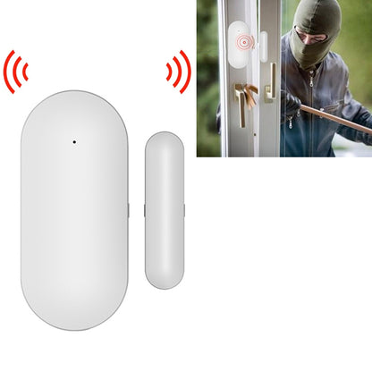 White wireless door and window sensor with magnetic contact, oval body and slim unit