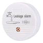 Round white leakage alarm sensor with faucet water icon, speaker symbol, and 90dB mark