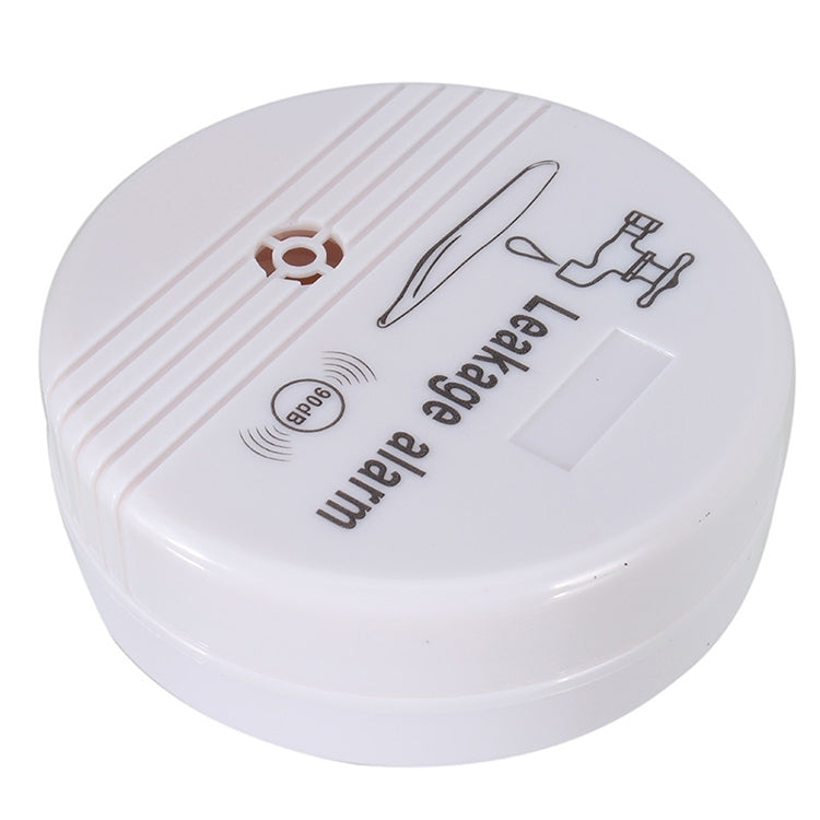 White water leak alarm sensor top view with HH-LS518 text and 90dB marking