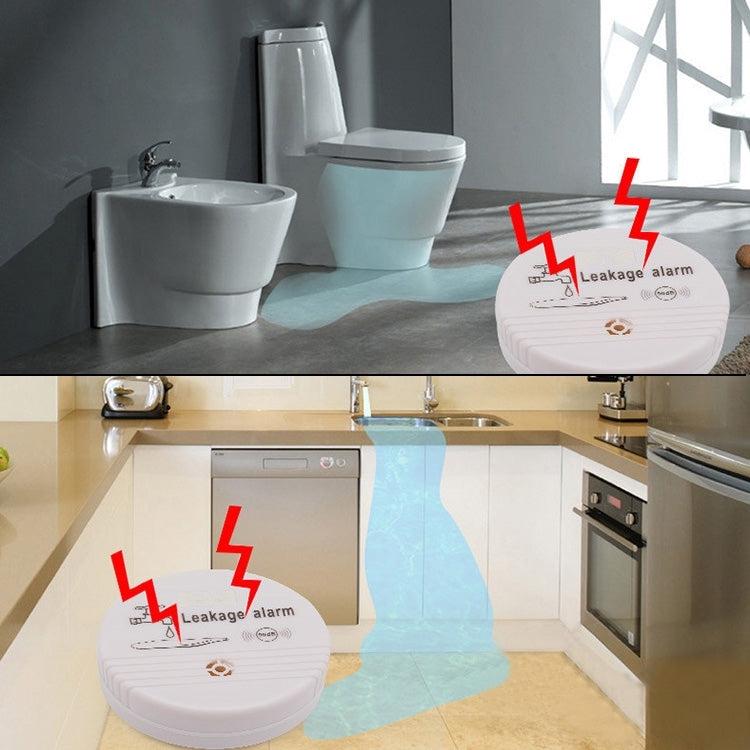 Two white round water leak alarm sensors with leakage alarm icons
