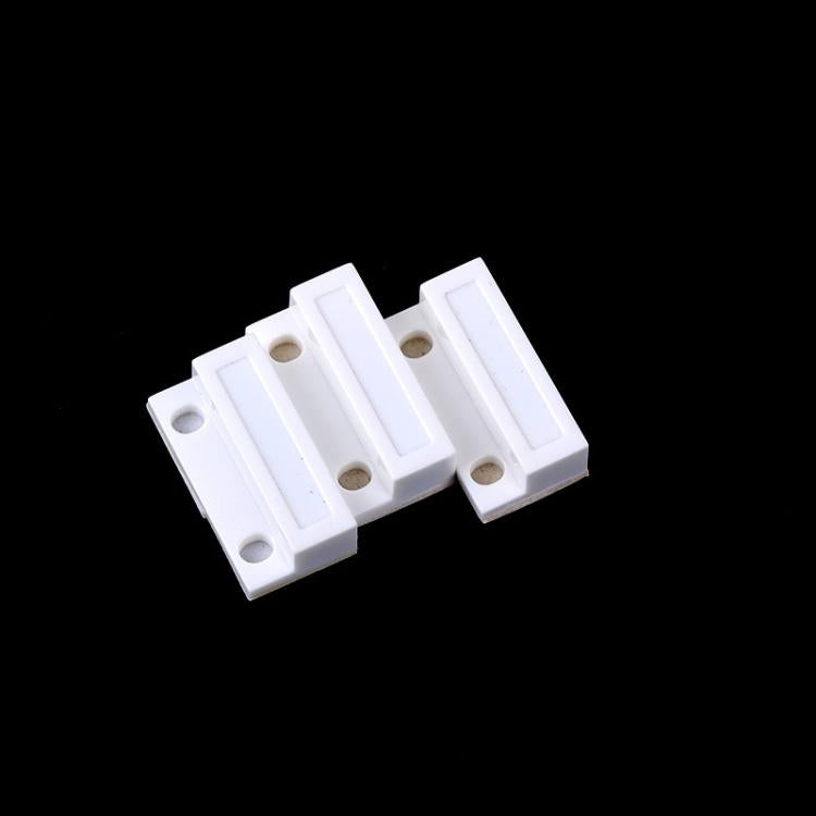 White magnetic sensor contact bars, four pieces with circular mounting holes