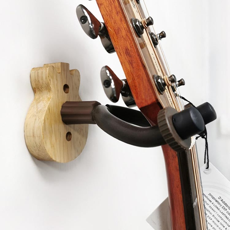 Wood guitar/ukulele wall hook with black padded clamp holding instrument neck
