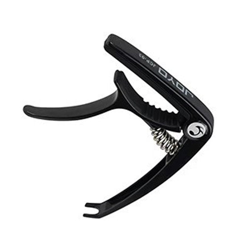 Black zinc alloy guitar capo, angled view with spring tension lever and pads