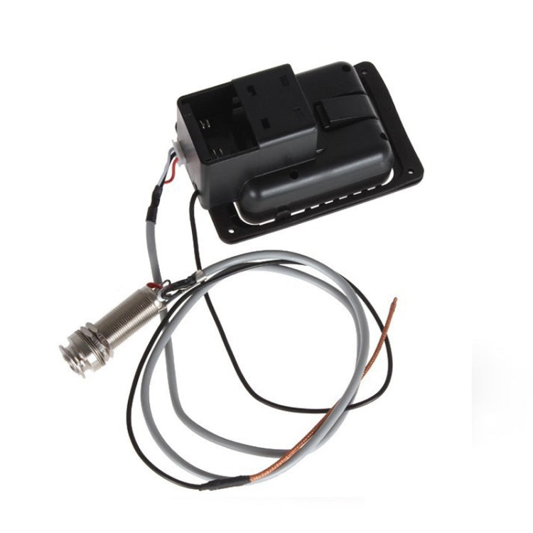 Guitar EQ preamp module underside with output jack and connected wiring harness