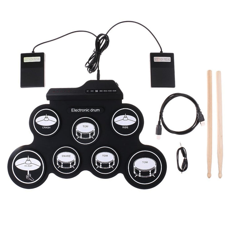 Black electronic roll-up drum controller with connected foot pedals, cable, and two sticks
