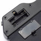 Black electronic drum open battery compartment with metal contacts and wiring slot
