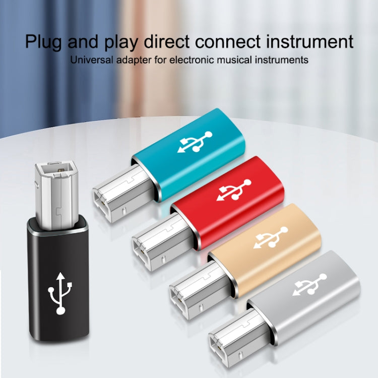 Set of Type-C to MIDI adapters in blue, red, gold, and gray with USB-C ends