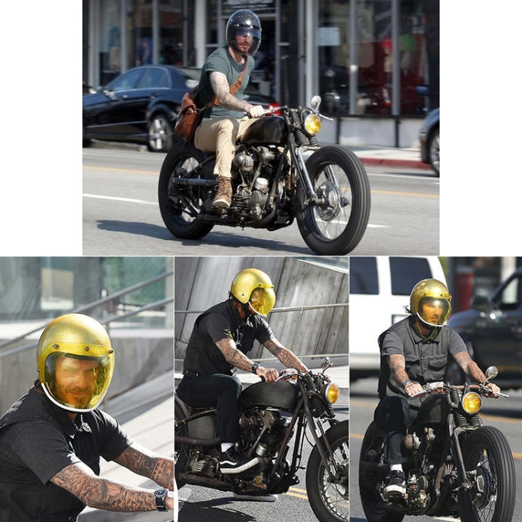 Motorcycle helmet bubble visor with yellow and tinted mirrored lenses, worn by rider