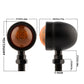 Pair of black LED turn signals with amber lens, showing front view and size markings